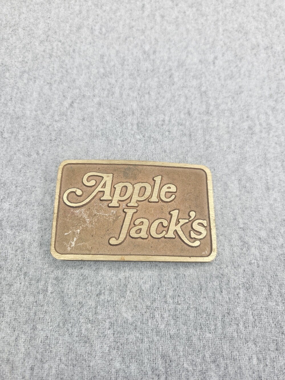 Vintage Apple Jack's Brass Advertising Belt Buckle Retro Script Logo Rare